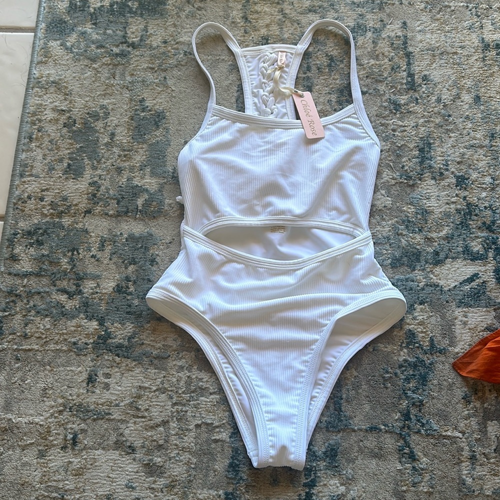 NWT. White ribbed one piece swimsuit. Boutique.